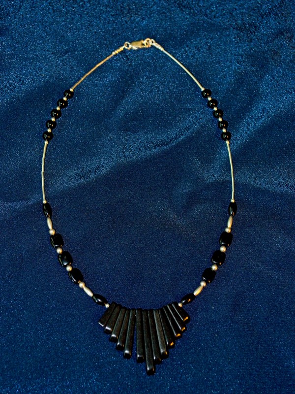 black onyx fan strung on mini-cable with sterling and fancy black onyx beads