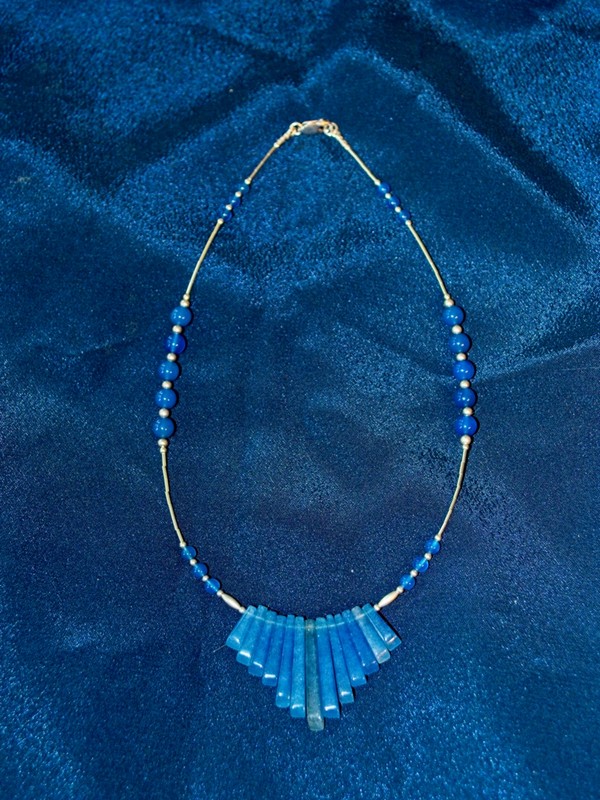 image of blue onyx fan and beads strung on min-cable