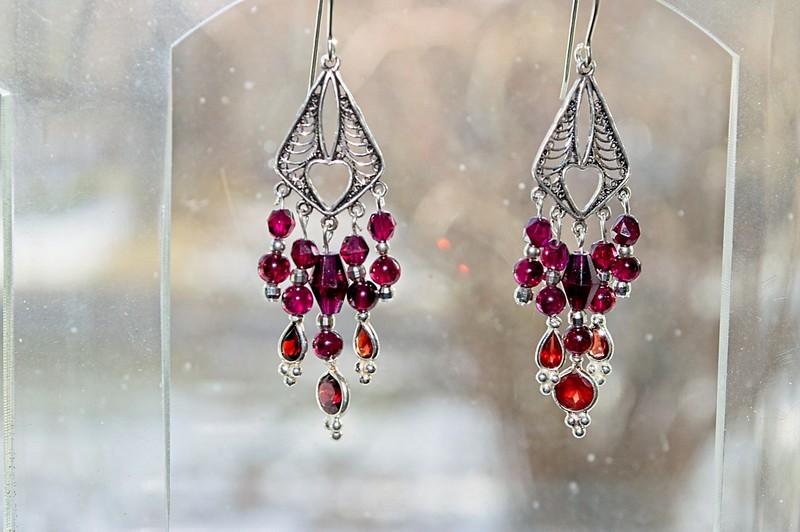 image of sterling silver filigree earrings with garnet beads and faceted stone drops