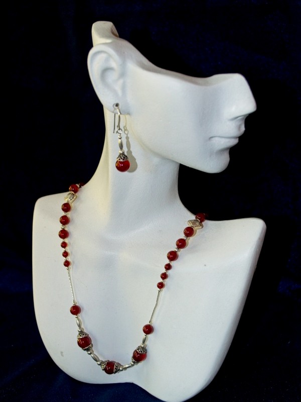 necklace and earring set featuring bright carnelian beads