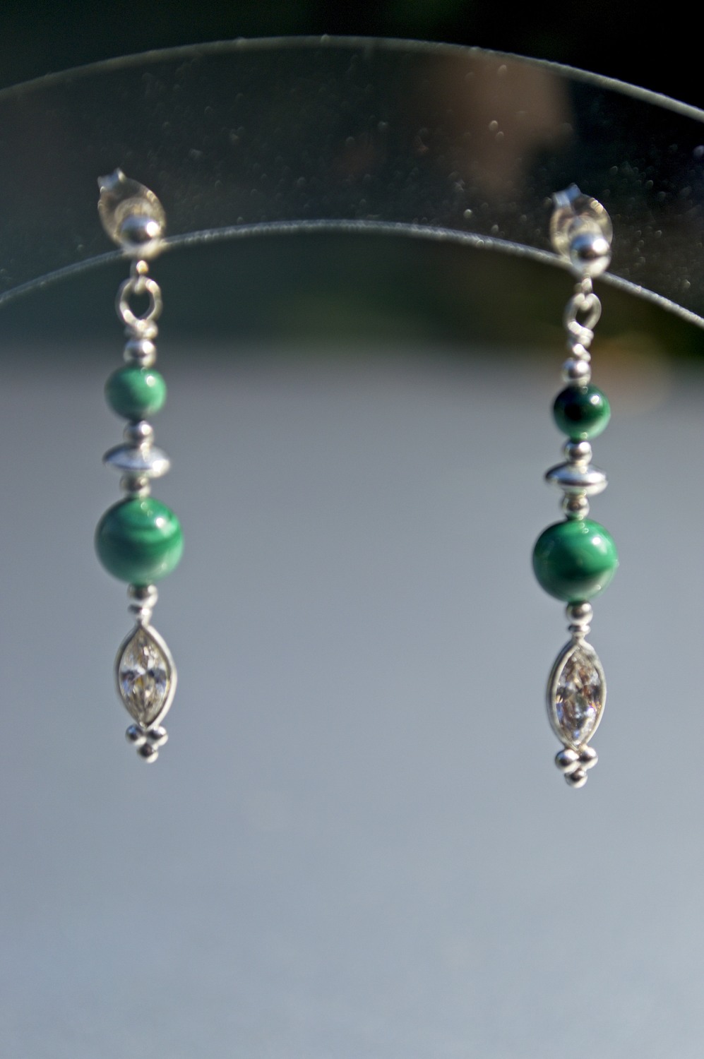 image of silver, malachite, and cz earrings