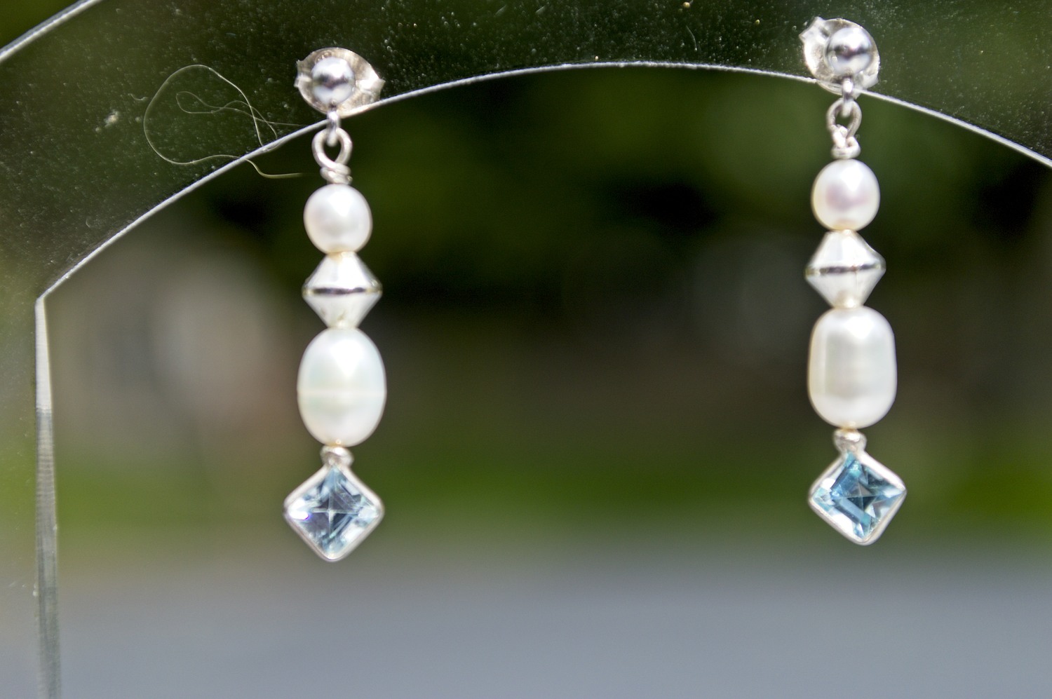 image of freshwater pearl and blue cz earrings