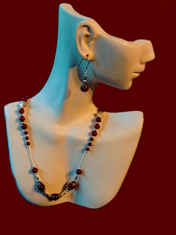 image of garnet and sterling silver necklace and earring set
